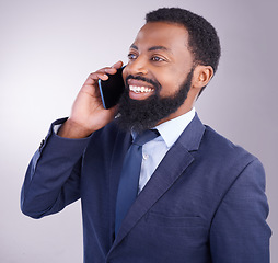 Image showing Corporate black man, phone call and smile in studio for business conversation, hello and chat. Happy executive, male model and cellphone communication for mobile networking, contact and talk feedback