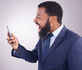 Image showing Business black man, angry phone call and studio with bad deal, mistake and frustrated by white background. Corporate, african businessman and smartphone for shouting with anger, stress and anxiety