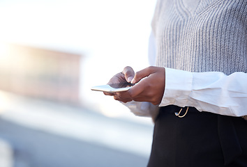 Image showing Hands, phone and texting in street for woman with communication, networking or chat outdoor. Journalist, content creator and smartphone for social network, news lead and notes on mobile app in metro