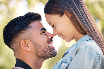 Image showing Face, smile and a couple in the garden together, feeling happy while dating for romance in summer. Love, park or spring with a man and woman bonding outside in nature as a romantic partnership