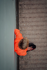 Image showing Top view photo of omen in sports clothes running in a modern urban environment. The concept of a sporty and healthy lifestyle