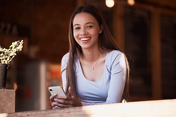 Image showing Woman, smartphone or smile portrait in cafe, coffee shop or restaurant for social media, internet blogging or communication. Happy, face or freelancer on mobile technology app for relax break or rest