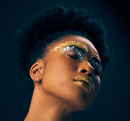 Image showing Beauty, gold and fantasy with black woman and makeup in studio for luxury, cosmetics and African pride. Natural, creative and goddess with female model on background for queen, bronze and glamour