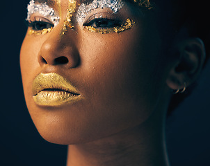 Image showing Beauty, gold and face with black woman and makeup in studio for luxury, cosmetics and African pride. Natural, creative and goddess with female model on background for queen, bronze and glamour