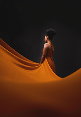 Image showing Black woman, art and fashion, fabric with mockup on dark background with beauty and aesthetic movement. Flowing silk, fantasy and artistic African model in creative designer dress in studio from back