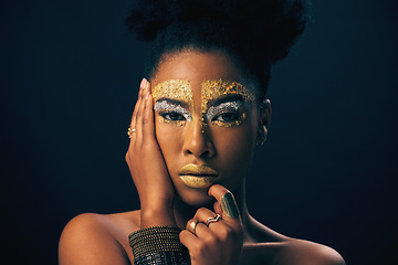 Image showing Makeup, gold and fantasy with portrait of black woman in studio for luxury, cosmetics or African pride. Natural, creative and goddess with female model on background for queen, bronze or glamour art