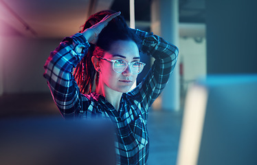 Image showing Cybersecurity, password and woman hacker getting ready while working on a computer at night for phishing. Database, malware and ransomware with a female coder hacking a digital transformation network