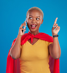 Image showing Woman, phone call and superhero for talk by background in studio for idea, happy or customer service. Young african girl, model and super hero cape with chat, consulting or communication for advice