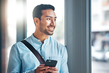 Image showing Happy, thinking and an Asian man with a phone for social media, communication and chat. Business, idea and a Chinese employee typing on a mobile app, replying to a message or work email online