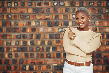 Image showing Pointing, mockup and portrait of black woman and brick wall background for announcement, product placement and offer. Idea, news and deal with female and gesture for information, opportunity and show