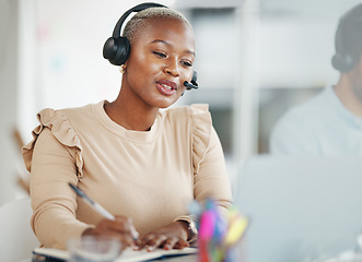 Image showing Call center and writing black woman consultant in office talking, technical support or advisory service planning. Contact agent or virtual person speaking in telemarketing, telecom or online business