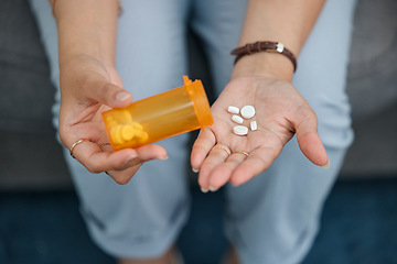 Image showing Hands, pill bottle and tablet for health, sick person and pharmaceutical with iron supplement for medical problem. Healthcare, plastic container and pharmacy drugs in palm with pain relief medicine