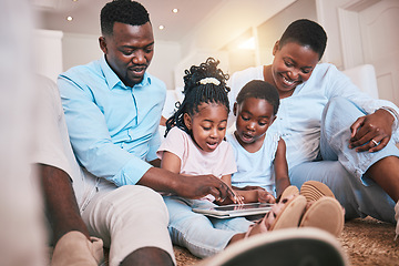 Image showing Relax, happy and tablet with black family in living room for streaming, games and elearning app. Digital, technology and internet with parents and children at home for movies, education and network