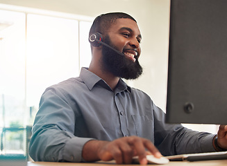 Image showing Man, computer and call center for happy communication, sales advisor and customer support in e commerce. Agency worker, telecom and african person with virtual chat, helping or web contact on desktop