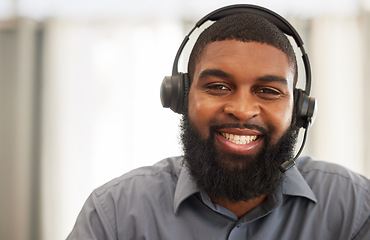 Image showing Man, portrait and call center agent or consultant for communication, technical support and consulting online. Happy face of African person for virtual consultation, IT helping or contact us at agency