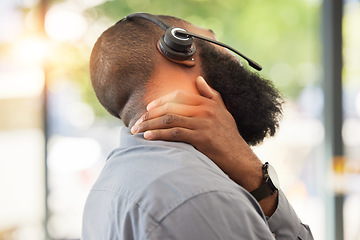 Image showing Black man, neck pain and working in call center, injury and sick customer service employee with health problem. Male consultant, CRM and headset with mic, fibromyalgia and muscle tension with stress