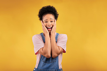 Image showing Portrait, surprise and woman with a smile, excited and announcement on a yellow studio background. Female person, happiness and model with shock, wtf and omg with news, winning and facial expression