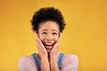 Image showing Thinking, surprise and woman with a smile, excited and expression on a yellow studio background. Female person, happiness and African model with shock, emoji and omg with good news, winning and wow