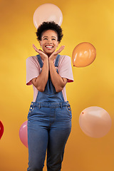 Image showing Balloons, wow and happy woman on birthday, prize or giveaway success, winning and celebration. Party, excited and young african person or gen z winner, competition or sale on yellow studio background