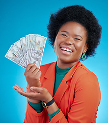 Image showing Money, offer and business woman in portrait for winning, cash and lottery fan on blue background. Face, investment and rich african person or winner with bonus, cashback and financial loan in studio