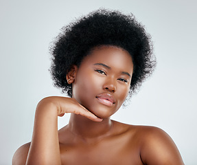 Image showing Face, beauty and skincare of black woman with confidence in studio isolated on a white background. Portrait, serious and natural model with cosmetic, facial treatment or aesthetic, wellness or health