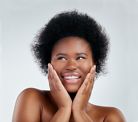 Image showing Skincare, health and female model in studio with a natural, wellness or cosmetic face routine. Beauty, young and headshot of an African woman with facial dermatology treatment by a gray background.