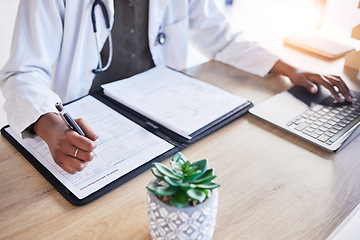 Image showing Doctor hands, insurance and writing at desk, typing and laptop for report, results or ideas for healthcare. Medic, book and pen for paperwork, compliance and info in notebook by computer in hospital