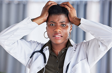 Image showing Frustrated, portrait and a black woman or doctor with a mistake in healthcare, surgery fail or problem. Headache, burnout and an African surgeon with clinic stress, medical crisis or anxiety