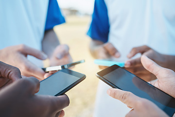 Image showing Hands, phone and networking with sports people in a huddle for communication or connectivity. Mobile, social media or information sharing with a person group standing in a circle closeup outdoors