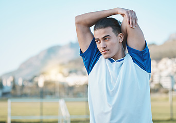 Image showing Thinking, man or soccer player stretching arms on football field in training, exercise or workout in Brazil. Fitness, warm up or male athlete ready to start practice match or sports game in stadium