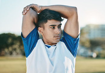 Image showing Man, soccer field or football player stretching arms thinking of training, exercise or workout in Brazil. Fitness, warm up or male athlete ready to start practice match or sports game in stadium