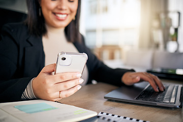 Image showing Woman, typing and laptop in office with phone, thinking and planning post schedule for blog on app. Copywriting content creator, website manager and computer with smile, idea or social media at desk