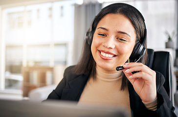 Image showing Happy woman, call center and headphones for customer service, telemarketing or support at the office. Face of friendly female person, consultant or agent smile for online advice or help at workplace