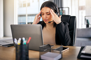 Image showing Woman, call center and headache in stress, mistake or client problem on laptop at office desk. Frustrated female person, consultant or agent with bad head pain, anxiety or burnout at the workplace