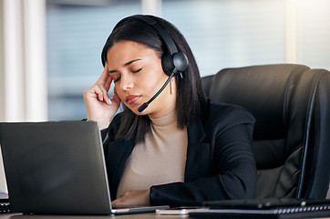 Image showing Tired woman, call center and headache in stress, mistake or client problem on laptop at office desk. Frustrated female person or consultant agent in bad head pain, anxiety or burnout at the workplace