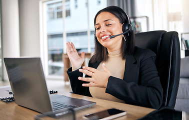 Image showing Business woman, call center and laptop in video call for consulting, telemarketing or customer service at office. Female person, consultant or agent in virtual meeting on computer for online advice