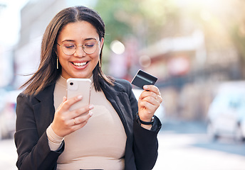 Image showing Woman, credit card and phone in street with smile for deal, sale or discount on payment for online shopping. Girl, smartphone and fintech for cybersecurity, e commerce and thinking for choice on app