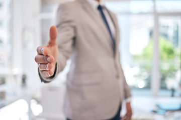 Image showing Closeup of a businessman stretching for a handshake in the office for partnership, greeting or agreement. Success, welcome and zoom of professional male person with shaking hands gesture for welcome.