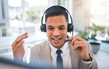 Image showing Happy man, call center and consulting on headphones in customer service, support or telemarketing at office. Male person, consultant or agent talking in online advice, help or contact us at workplace