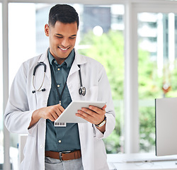 Image showing Happy man, doctor and tablet in medical research for innovation, networking or Telehealth at hospital. Male person or healthcare professional smile on technology for online communication or browsing