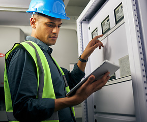 Image showing Electrician, engineering and tablet with man in control room for inspection, quality assurance and energy. Electricity, safety and industrial with handyman for maintenance, technician check and power