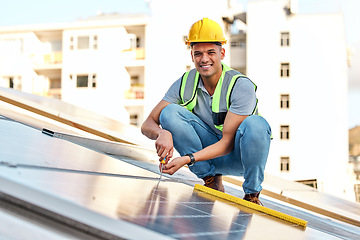 Image showing Clean energy, solar panels and portrait of man on roof for installation, sustainable business and electricity. Engineer, sustainability and photovoltaic power on city rooftop with renewable resource.