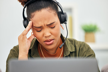 Image showing Stress, call center and headache of woman at laptop in customer service agency with pain, burnout or anxiety. Face, frustrated and tired black female consultant in challenge of client account problem