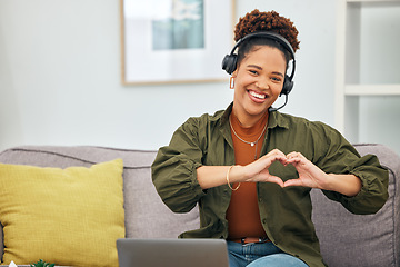 Image showing Heart in hands, customer service and portrait of black woman on sofa for remote work, business and startup. Working from home, emoji and female person with hand sign for love, care and crm support