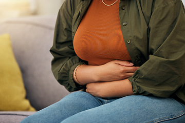 Image showing Sick woman, stomach pain and hands on abdomen for ibs, digestion and nausea of pms, virus or anxiety. Closeup female person, menstruation or belly problem of constipation, gut health or endometriosis