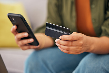 Image showing Hands of woman, credit card and online shopping on smartphone in home for digital payment, fintech account and money. Closeup, mobile banking app and budget of cash, web sales and financial password