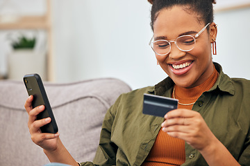 Image showing Happy black woman, credit card and ecommerce with phone for digital payment, fintech account and web finance at home. Female person smile for mobile banking, online shopping and budget on technology