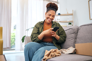 Image showing Online shopping, delivery and black woman with phone on sofa happy with package or product at home. Ecommerce, smile and African lady with smartphone for customer experience, survey or app in house