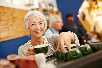 Image showing Great coffee made by great people. Shot of a senior couple running a small business together.