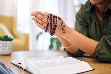 Image showing Hands, bible and home for prayer, rosary and mindfulness for faith, religion or reading with hope for future. Woman, praying and study holy book with cross for peace, mental health or worship to God